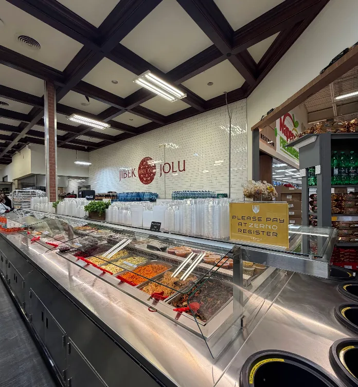 Jibek Jolu hot food buffet counter with Central Asian dishes