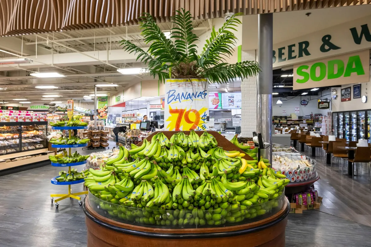 Fresh bananas display in the produce department at Naperville Fresh Market